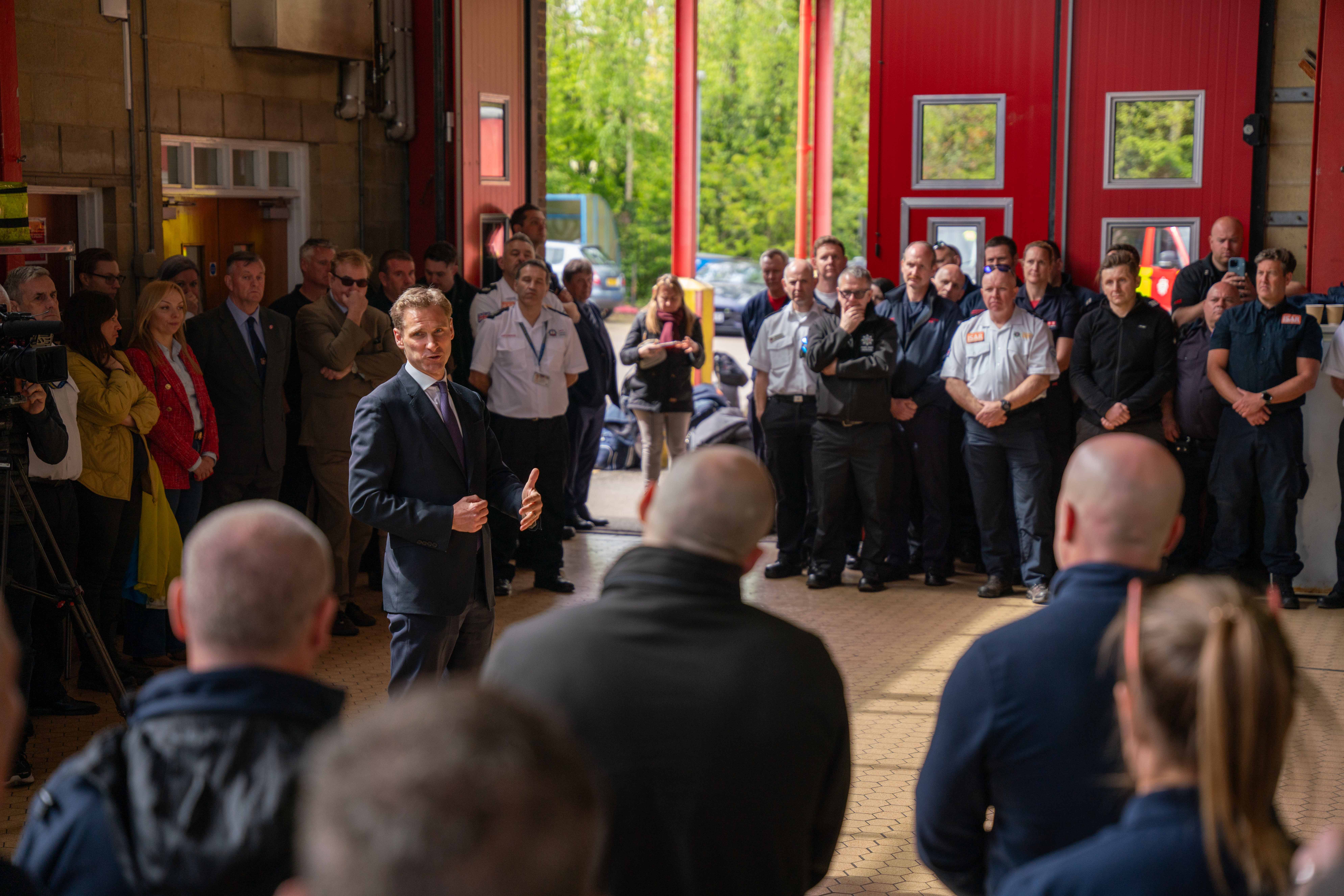 Minister Philp addressing volunteers UK fire and rescue services, FIRE AID and the Fire Industry Association.
