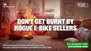 Don't get burnt by rogue e-bike sellers Check products reviews and only buy from trusted sellers to protect yourself from fire risks. Background shows an e-bike on fire in front of a window in a living room.