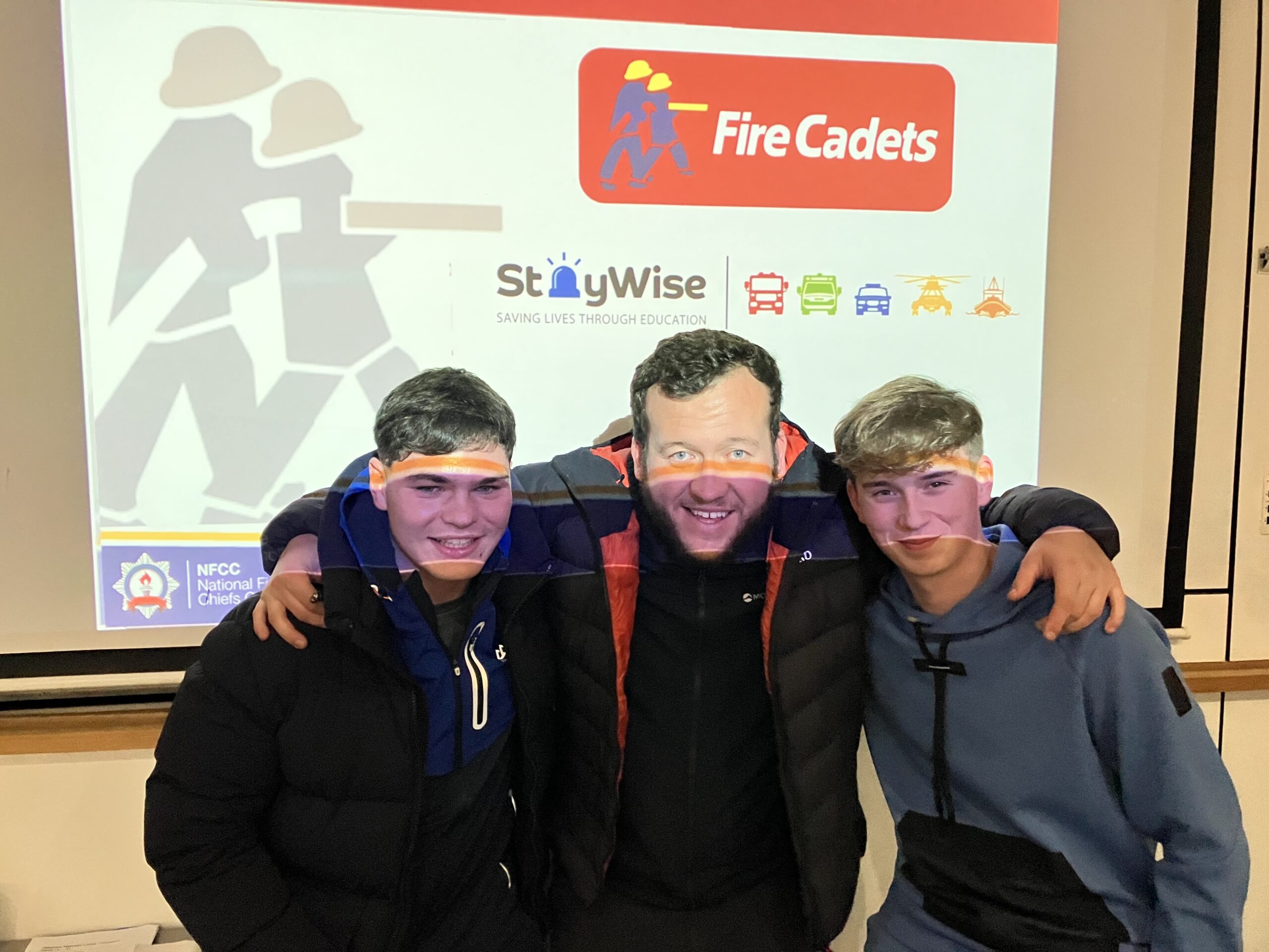 Charlie Hughes, Fire Cadet Unit Leader from Merseyside Fire and Rescue Service with two Fire Cadets at the Residential