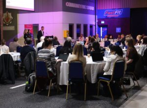 tables of staff at ACER conference